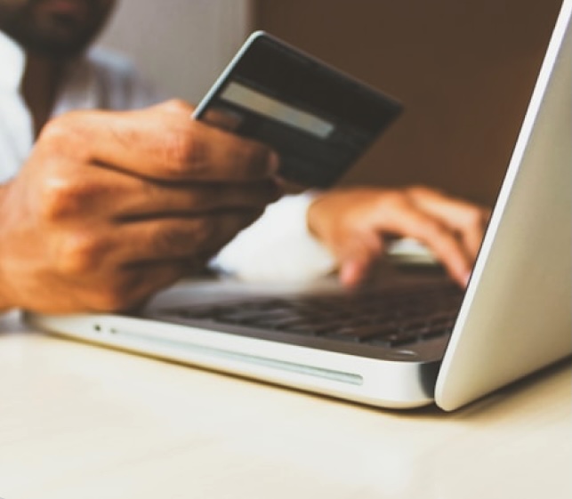 A person holding credit card