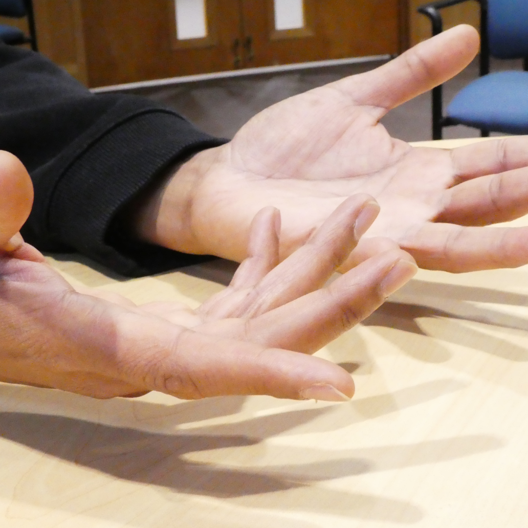 Hands of a person discussing an issue