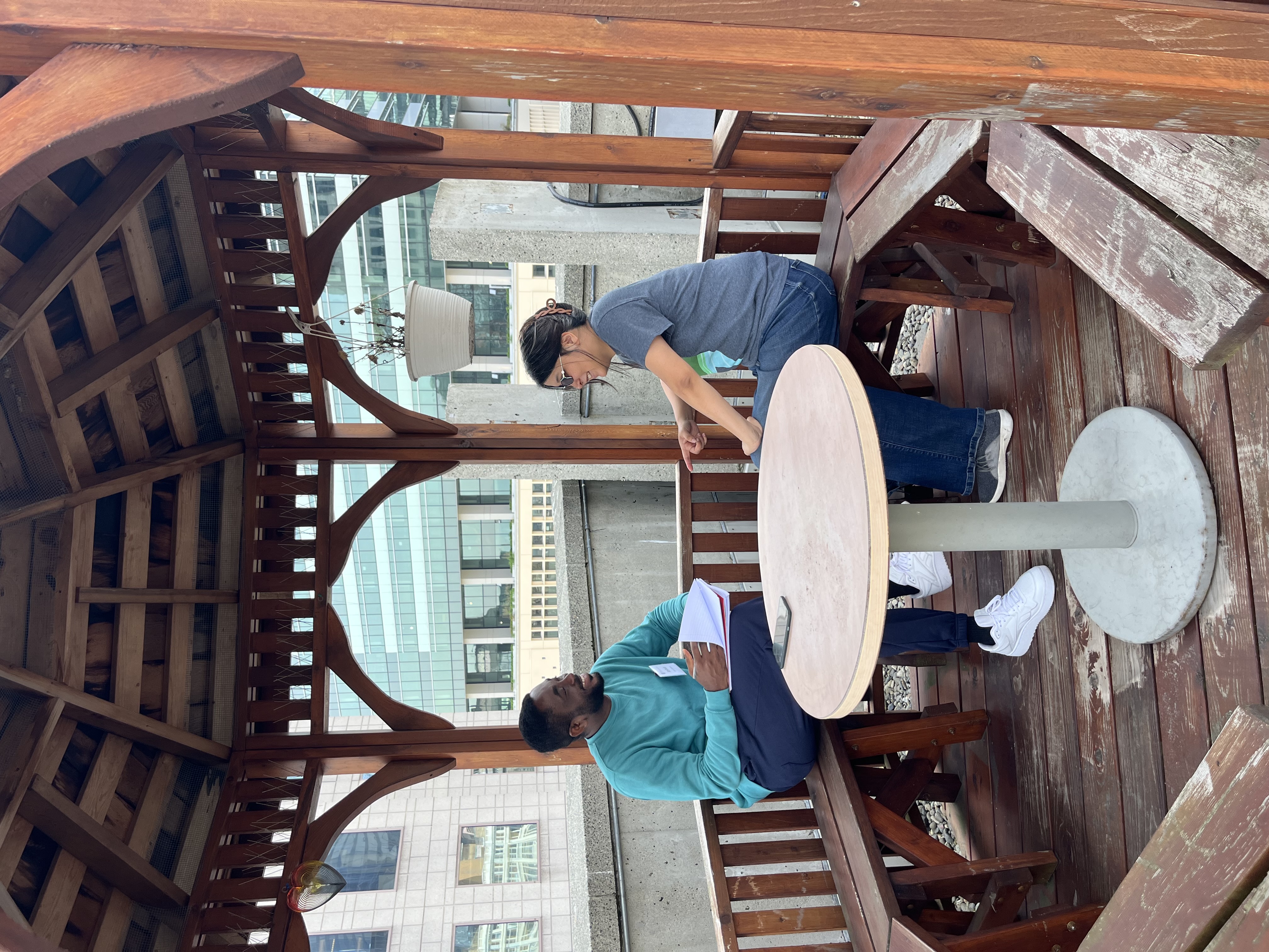 Joshua interviewing Toto in our 8F gazebo