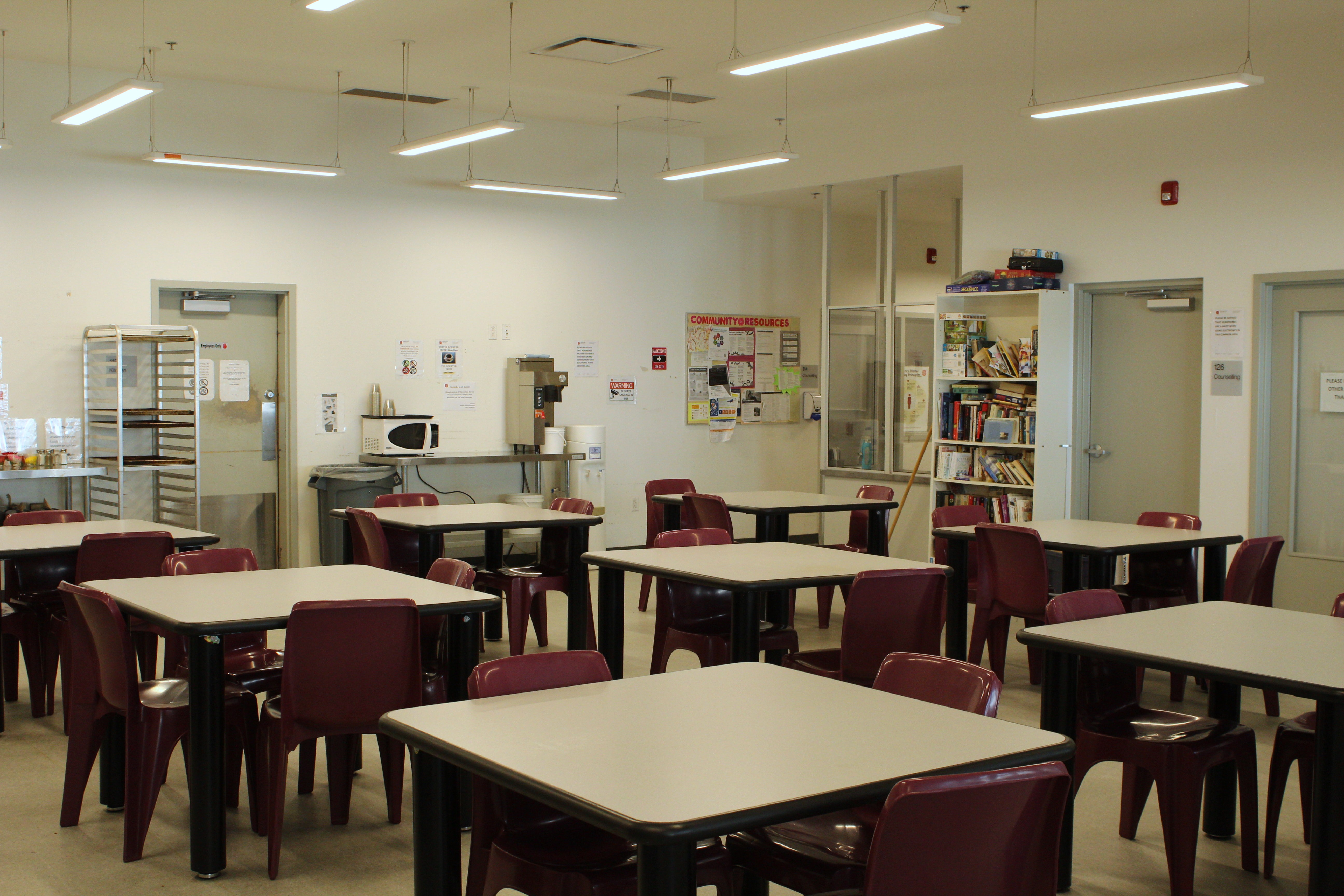 A room with tables and chairs